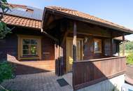 Ein Zuhause zum Wohlfühlen: Großzügiges Holzblockhaus mit Garten und moderner Haustechnik