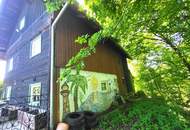 Charmantes Holzhaus mit Potenzial in ländlicher Lage