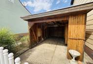 Entzückendes Einfamilienhaus mit Naturgarten, Nebengebäude und Carport