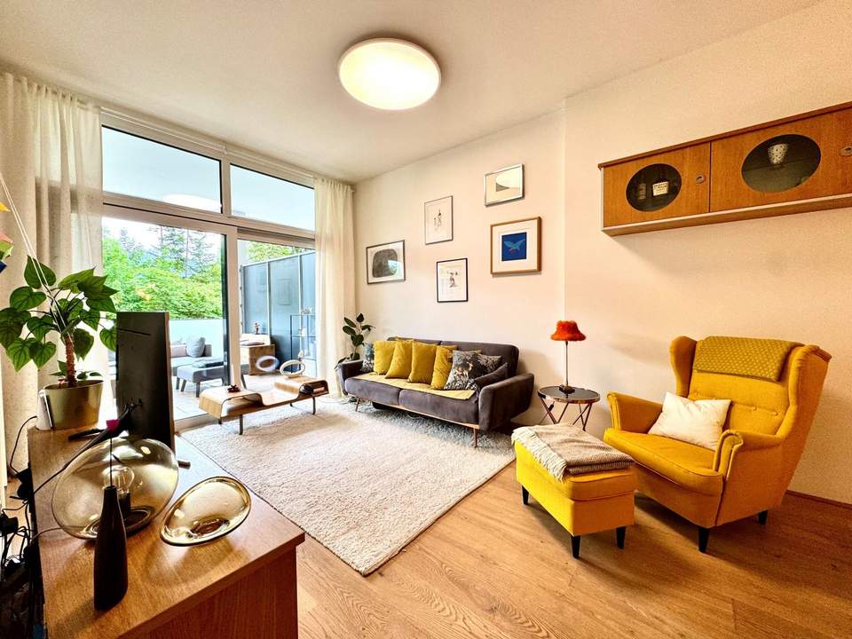 Hugerburg: Loftartige Designerwohnung mit Terrasse und Tiefgaragenstellplatz