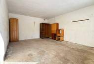 Einfamilienhaus mit Nebengebäude, Doppelgarage und großem Potenzial zur individuellen Gestaltung