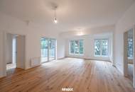 Sanierter Altbau mit modernem Neubau