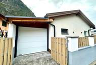Bungalow mit Garage und Garten