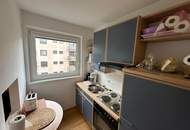 ZENTRAL UND DENNOCH RUHIG: LICHTDURCHFLUTETE 2-ZIMMER-WOHNUNG MIT XXL-GARAGE IN TOP-LAGE