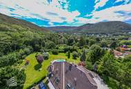 Beeindruckende Villa mit gepflegtem Garten und Pool als Investment