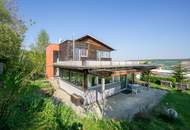 Nachhaltig wohnen mit Erdwärme – Architektenhaus in idyllischer Grünruhelage mit Weitblick