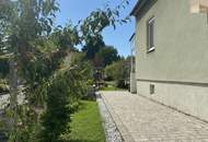 Einfamilienhaus mit Zubau - Tiefgarage und Garten