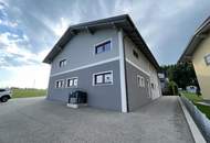 Mehrfamilienhaus mit Garage/Lager/Büro - Dorfwidmung