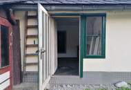 Sanierungsbedürftiges Zweifamilienhaus mit Nebengebäuden in Traumlage