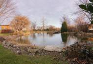 Exquisites Einfamilienhaus mit großem Garten und Schwimmteich