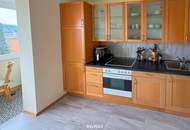 Traumhafte 2-Zimmer-Wohnung mit Penthouse-Flair und Weitblick durch den Wintergarten