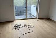 Modernes Zweifamilienhaus mit Gartenwohnungen – Erstbezug!