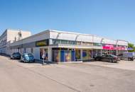 Grundstück mit vier Baukörpern - Büro-, Geschäfts- und Gewerbegebäude inkl. Parkplätzen in Vösendorf