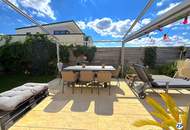 Passivhaus mit beheiztem Pool, Dachterrasse und separater Ordination – unverbaubarer Grünblick