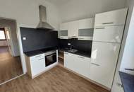 Neuwertige Wohnung im Postgebäude