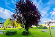 Familienfreundliche 4-Zimmer-Wohnung mit Tiefgaragenabstellplatz, Loggia, Gartenanlage & nachhaltiger Heizung