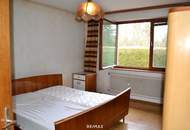 Vorne Garten. Hinten Grün. Innen viel Licht und Wohnqualität.