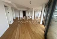 Großzügige 4 Zimmer Wohnung mit über 100 m² Balkon und Blick auf die Donau!