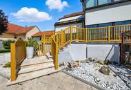 High-end living in a peaceful green location! A feel-good retreat in a class of its own: tradition meets state-of-the-art comfort!