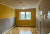 Niedrigenergiehaus! Geförderte 3-Zimmer-Gartenwohnung inkl. 2 Garagenplätze im Eigentum