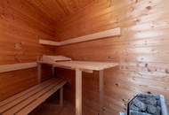"Familienfreundliches Einfamilienhaus mit Wellnessbad, Sauna, Kachelofen, Fußbodenheizung, großem Garten und Doppelgarage in Tulln"