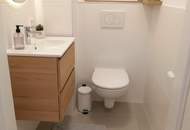 Befristet vermietete: klimatisierte 2-Zimmer-Wohnung mit hofseitiger Terrasse &amp; optionaler Garagenstellplatz!