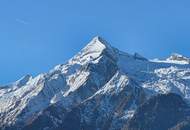 Seltenes Juwel: Gepflegtes Einfamilienhaus direkt am Golfplatz mit Kitzsteinhornblick