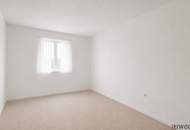 Neubauwohnung mit Grünblick und 4-Zimmer Möglichkeit in einem gepflegten Haus