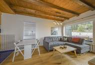 Dachgeschosswohnung an der Skipiste mit Kaiserblick