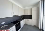 Erstbezugs-Dachgeschosswohnung in zentraler Lage