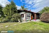 Baugrundstück mit Bungalow / U-Bahn in wenigen Gehminuten erreichbar