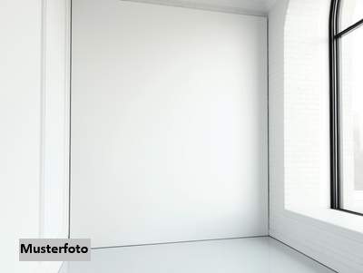 Attraktive DG-Wohnung mit Balkon und seltenem Gartenanteil