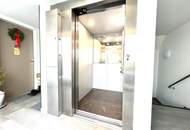 TRAUMLAGE AM MÜHLWASSER!: TOP PREIS! I ERSTBEZUG Dachgeschosswohnung I KLIMATISIERT I Gemeinschaftsgarten I Lift I Garagenstellplatz