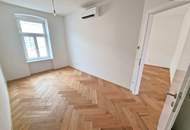 ***Altbau trifft Moderne – hochwertig sanierte 3-Zimmer-Wohnung mit Klimaanlage, Luftwärmepumpe, hofseitiger Terrasse &amp; edler Ausstattung***