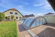 Energieeffizientes, großzügiges Einfamilienhaus mit Pool, sonnigem Garten und beheiztem Wintergarten!