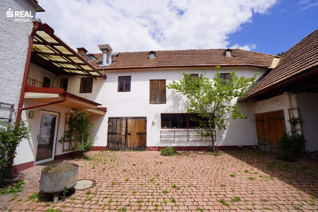 Großzügige Liegenschaft - Wohnhaus, Gastronomiebereich und 3.100 m² Garten im Zentrum