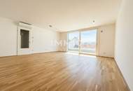 BEIM DONAUUFER: Klimatisierte 3-Zimmer-Dachgeschosswohnung mit sonnigem Glasbalkon