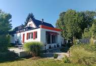 Stilvolles Einfamilienhaus mit großem Garten + Optionaler Baugrund