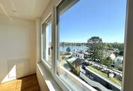Penthouse mit Donaublick und 360 Grad Dachterrasse - direkt an der Alten Dona