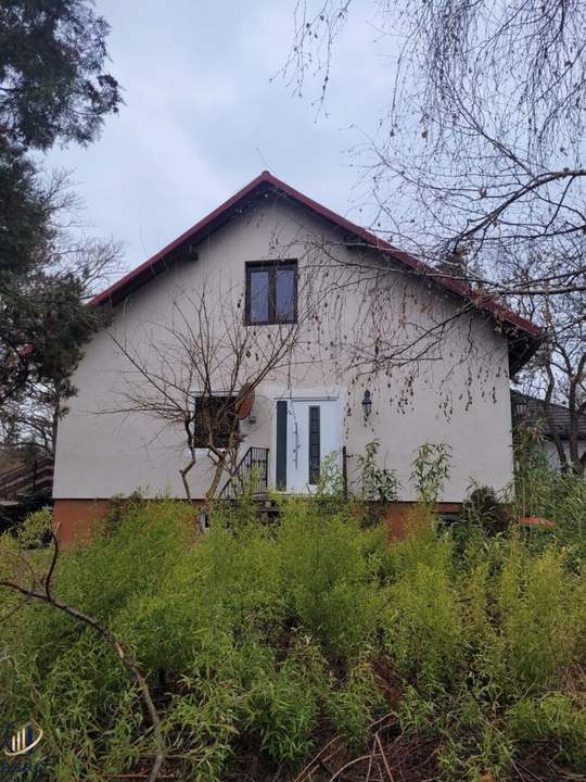 Sonniges Baugrundstück mit Bestandshaus in Grün- und Ruhelage