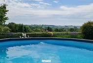Absolute Traumlage in Mühlbach: Geschmackvoller Landhausstil, parkähnlicher Garten, Pool und einmaliger Fernblick!