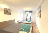 Sonnendeck-Terrasse im Innenhof, schön aufgeteilte 2-Zimmer Neubauwohnung