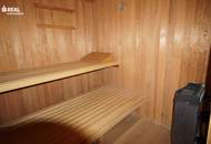 Bungalow in Siedlungsrandlage mit sensationellem Garten und Sauna-Bereich