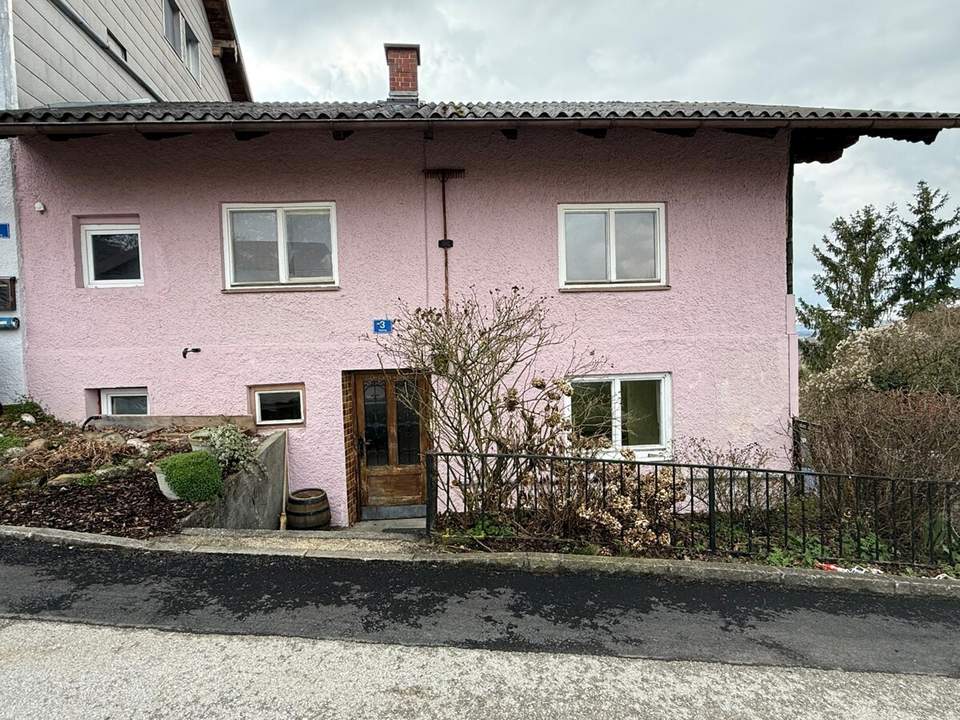 Haus in Hanglage mit beeindruckendem Weitblick – viel Potenzial für Ihre Wohnideen!