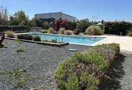 Modernes Bürogebäude mit Wohnnutzung und Pool!