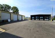 Wohnhaus mit 2.200m² großem Grundstück, Halle und Garagen