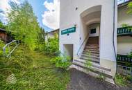 Sanierungsbedürftiges Wohnhaus mit 24 Wohneinheiten in Hanglage