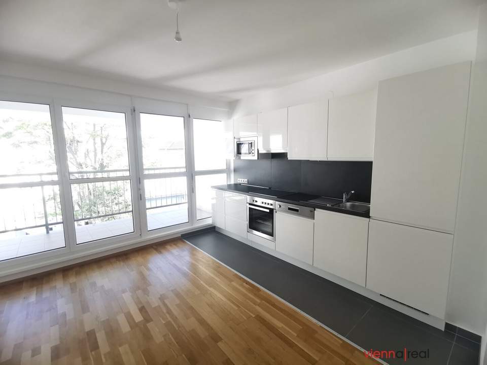 UNBEFRISTET - tolle Loggia - Helle 5-Zimmer Neubau Maisonette-Wohnung mit separater Küche, Lift, Gartennutzung und Garagenplatz optional