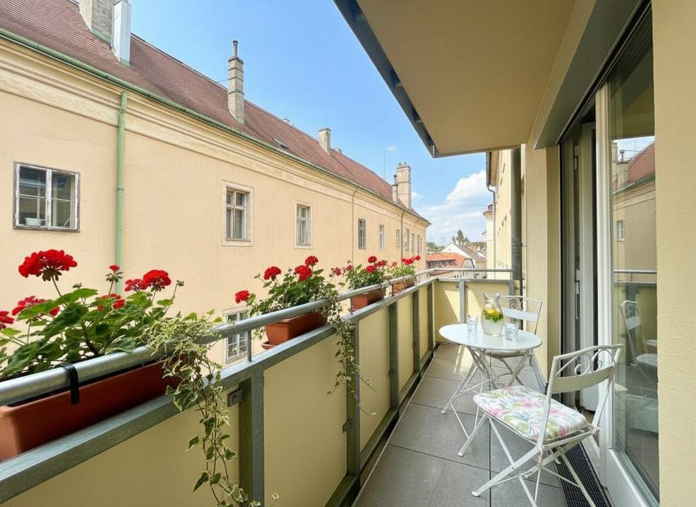IM HERZEN NUSSDORFS I Urban trifft Weinberge – Modernes Single-Apartment mit Balkon und Heurigen um die Ecke