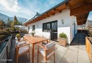 Lichtdurchflutete Dachwohnung mit Terrasse und privatem Garten